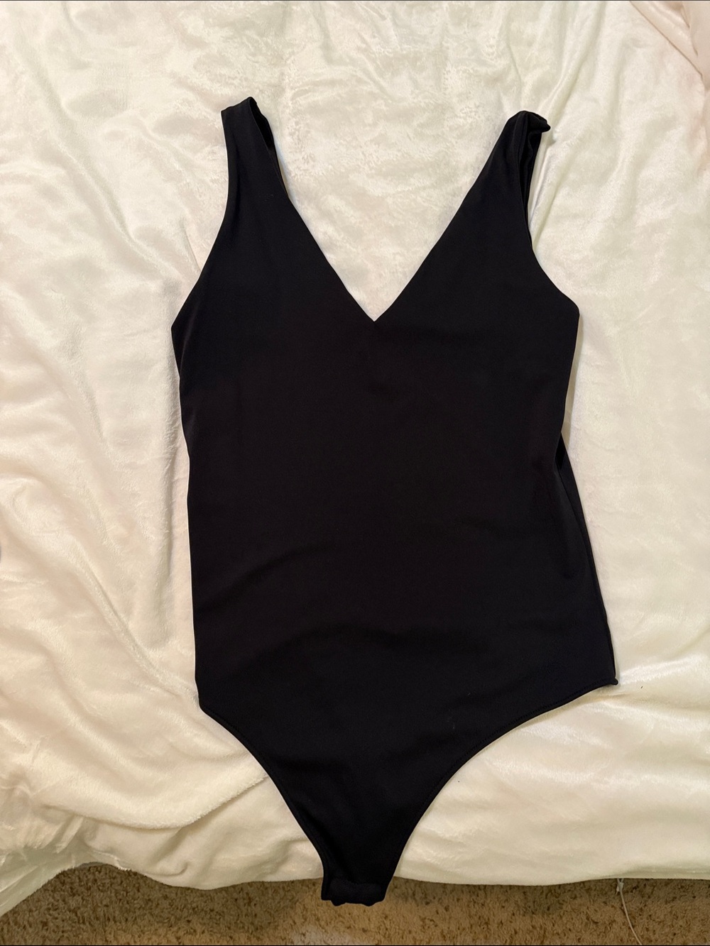 Women's Black V-Neck Bodysuit - Sleek Stretch Fit